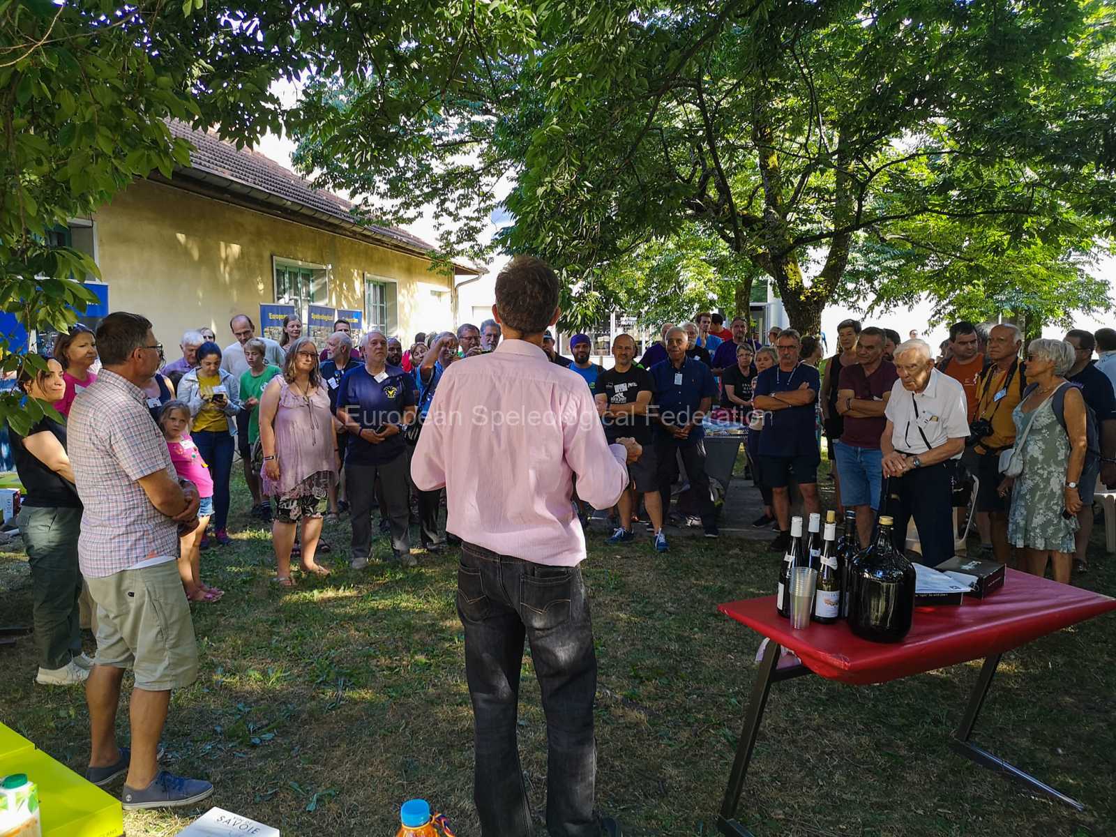 Lively apéro under the trees celebrating 30 years FSE. Photo by Ernest Geyer
